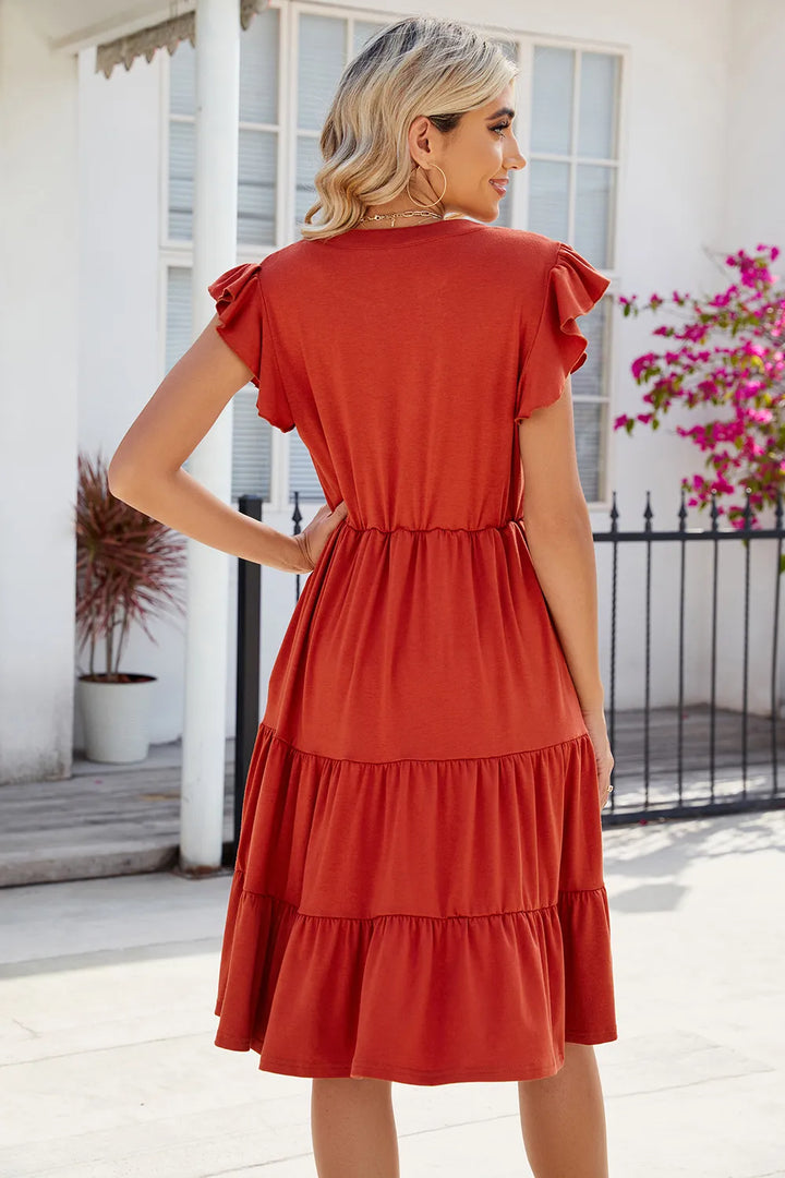 Flutter sleeve tiered midi dress with notched V-neck