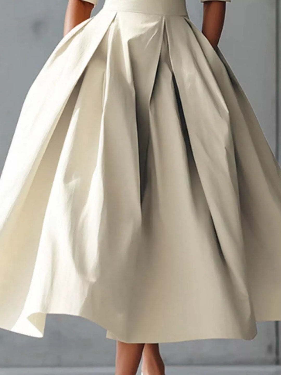 A-line pleated midi dress with side pockets
