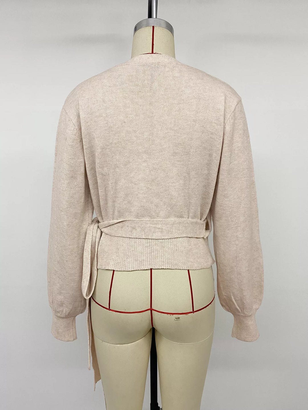 Surplice wrap sweater with side tie and drop shoulders