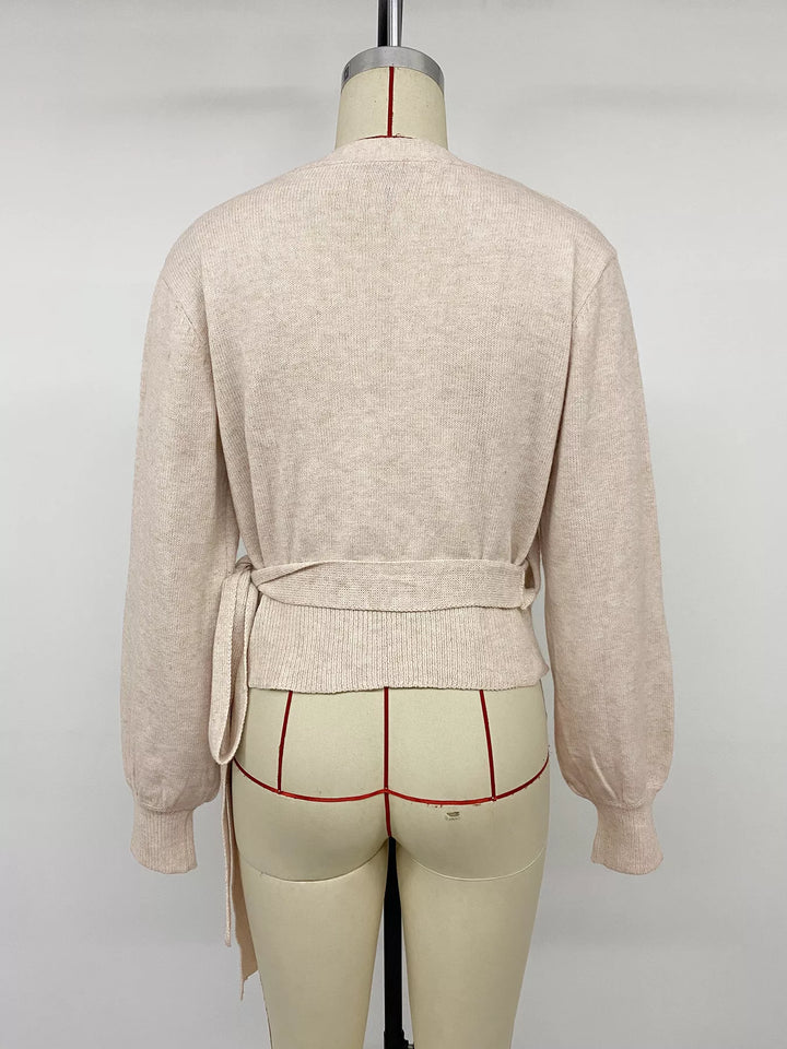 Surplice wrap sweater with side tie and drop shoulders