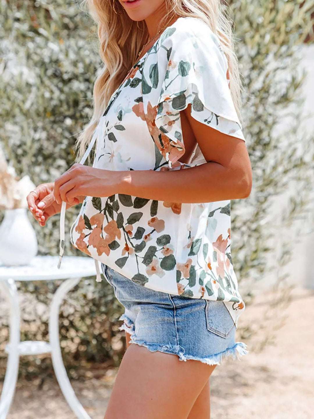Floral print V-neck button-down blouse with tie waist