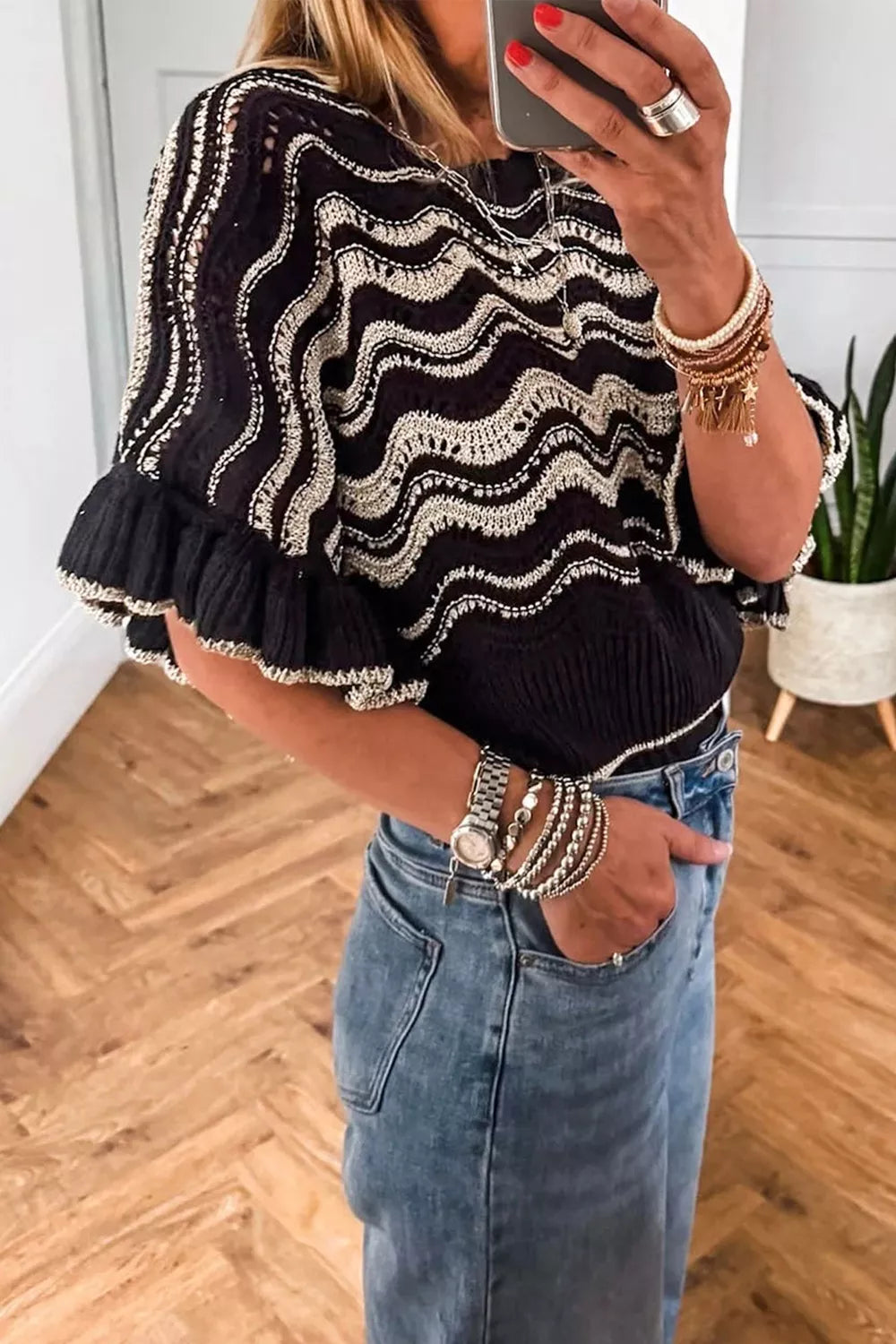 Openwork wave-knit sweater with tiered ruffle sleeves