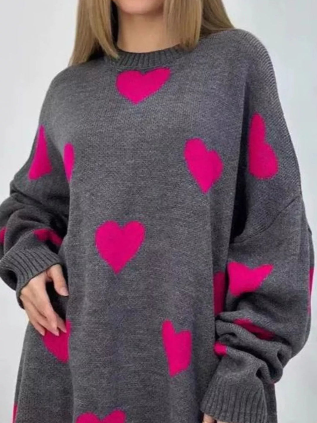 Oversized heart-print knit sweater with drop shoulders