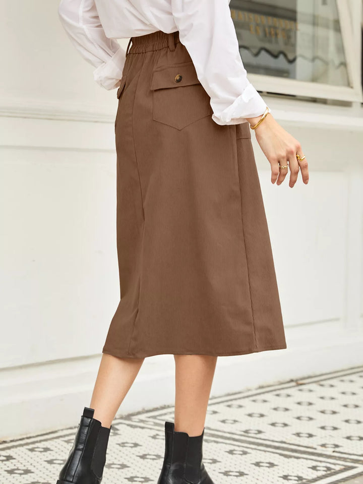 Ribbed high-waist midi skirt with front slit and pockets