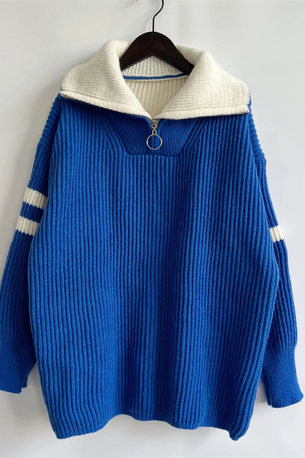 Quarter-zip ribbed knit sweater with striped sleeves