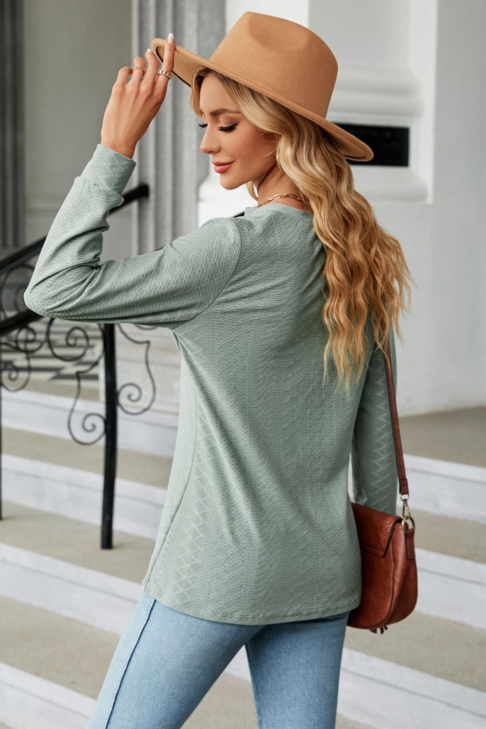 Textured knit long sleeve top with button placket