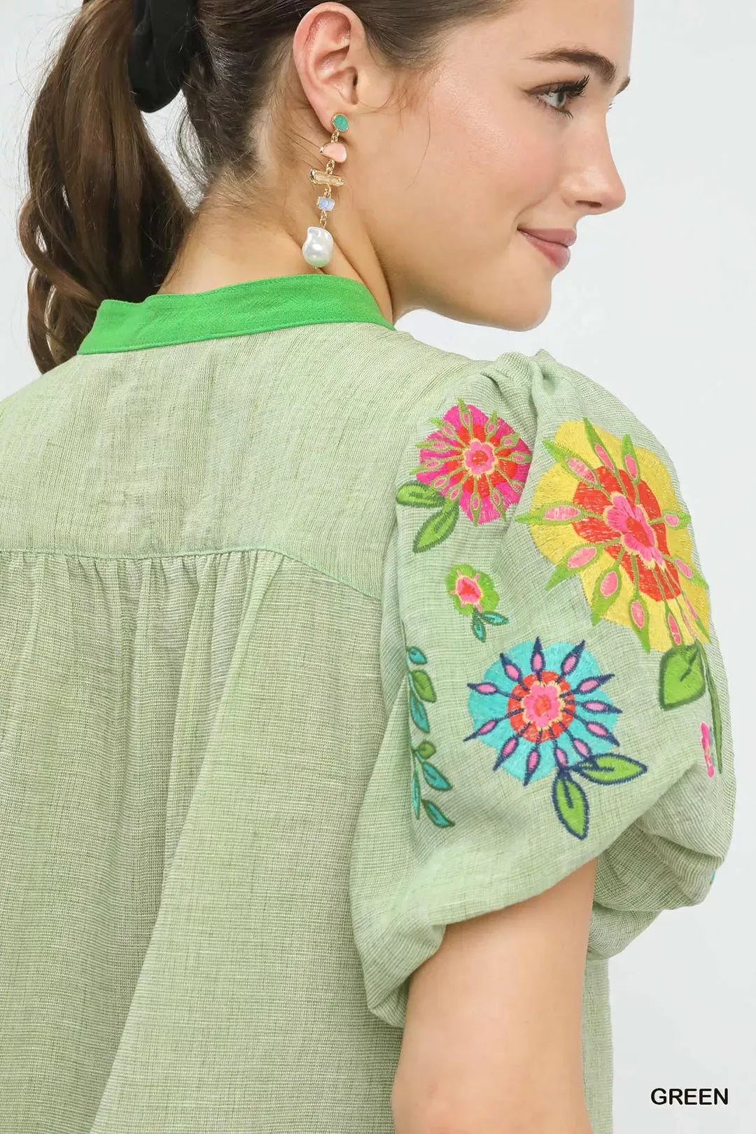 Floral embroidered puff sleeve top with split V-neck
