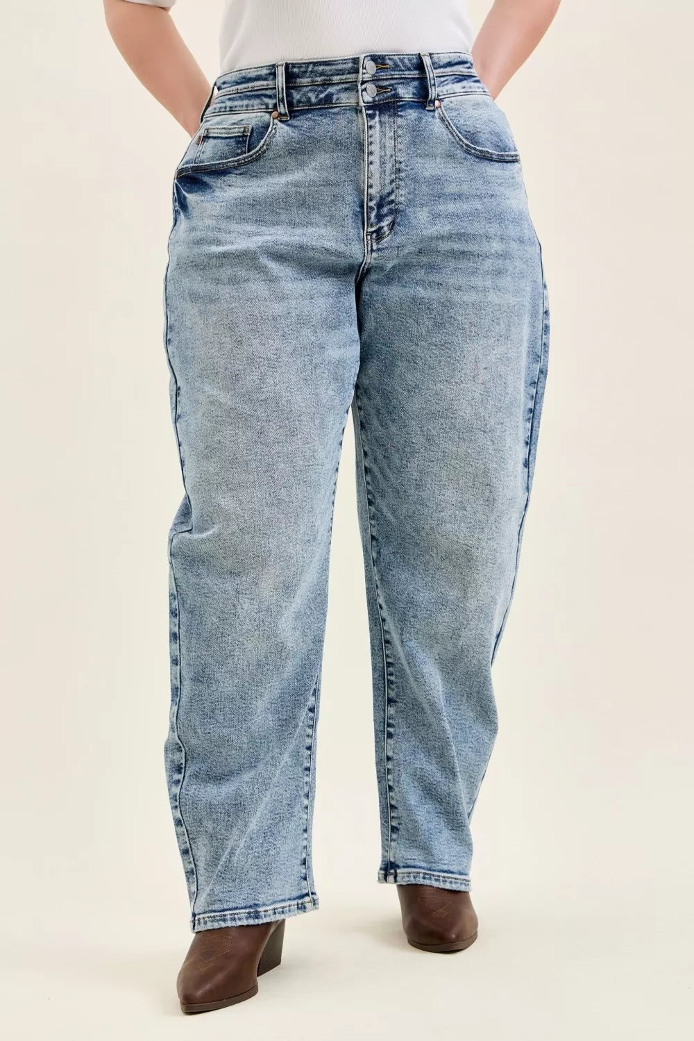 High-rise arc leg jeans with double waistband