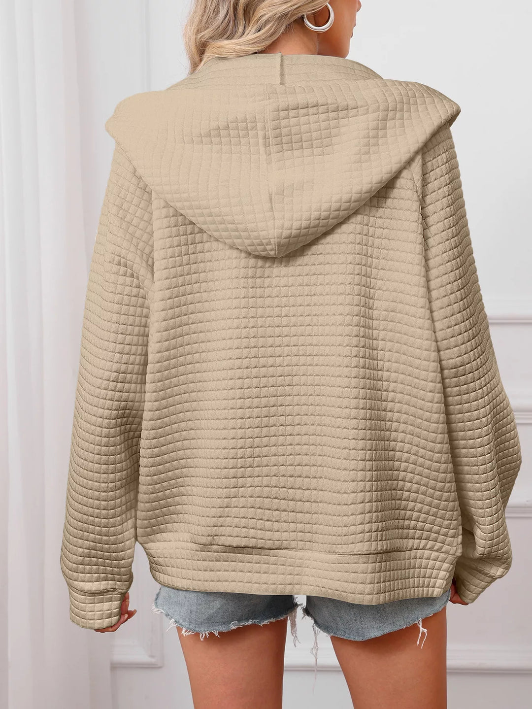Textured quilted zip-up hooded jacket with pockets