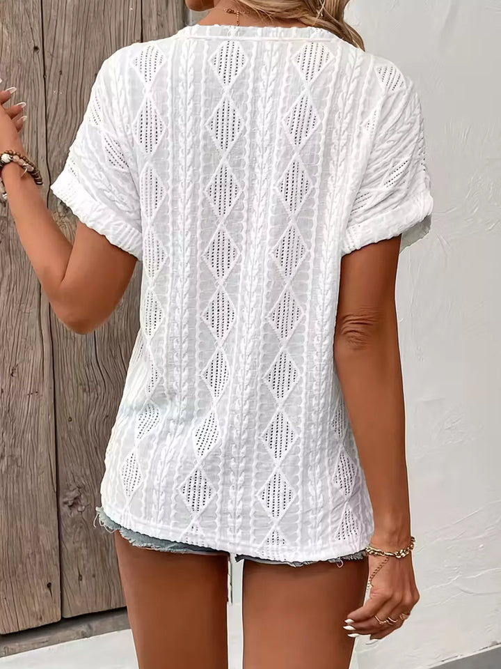 Diamond pointelle knit split-neck top with buttons