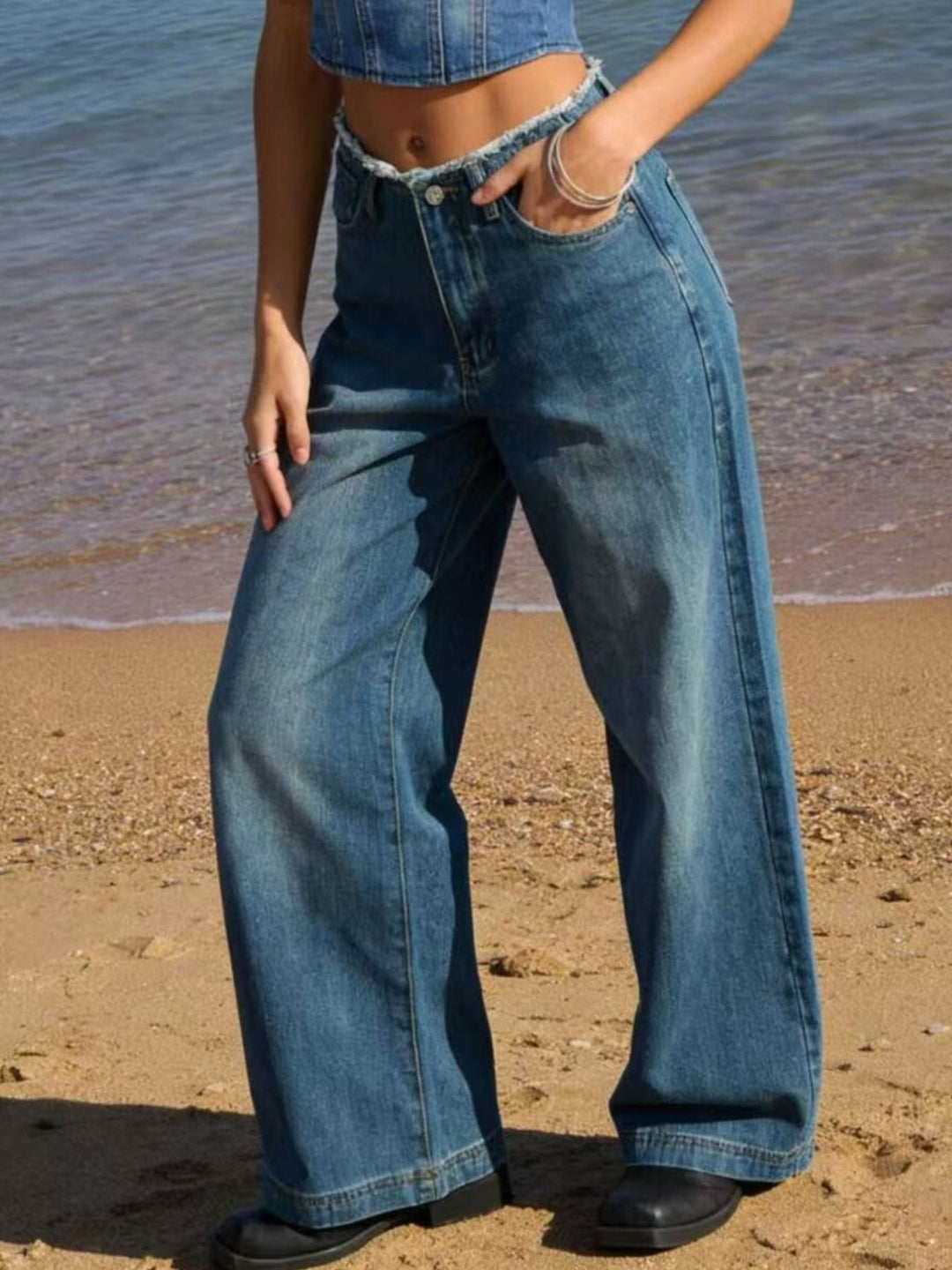 Frayed waistband high-rise wide-leg jeans