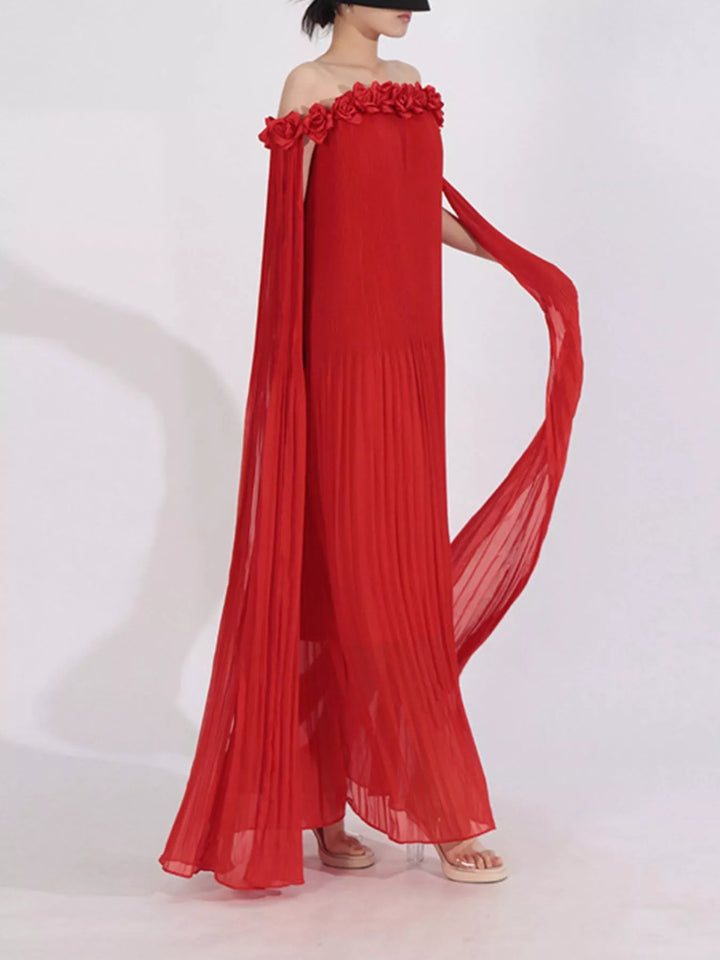 Off-shoulder pleated maxi dress with rosette neckline