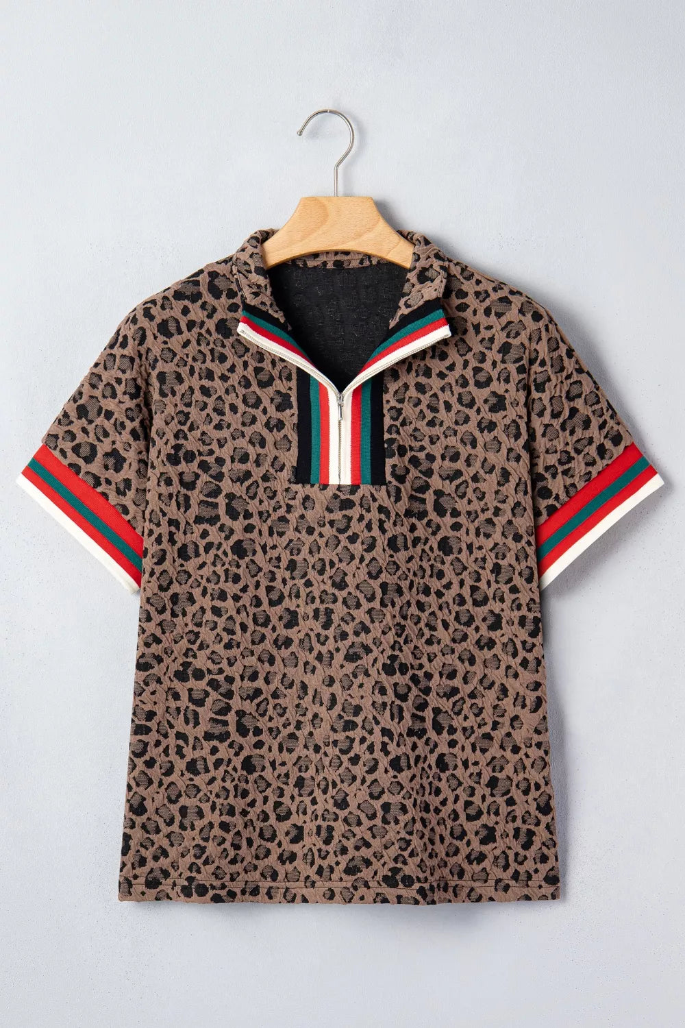 Leopard half-zip short sleeve top with striped collar and cuffs