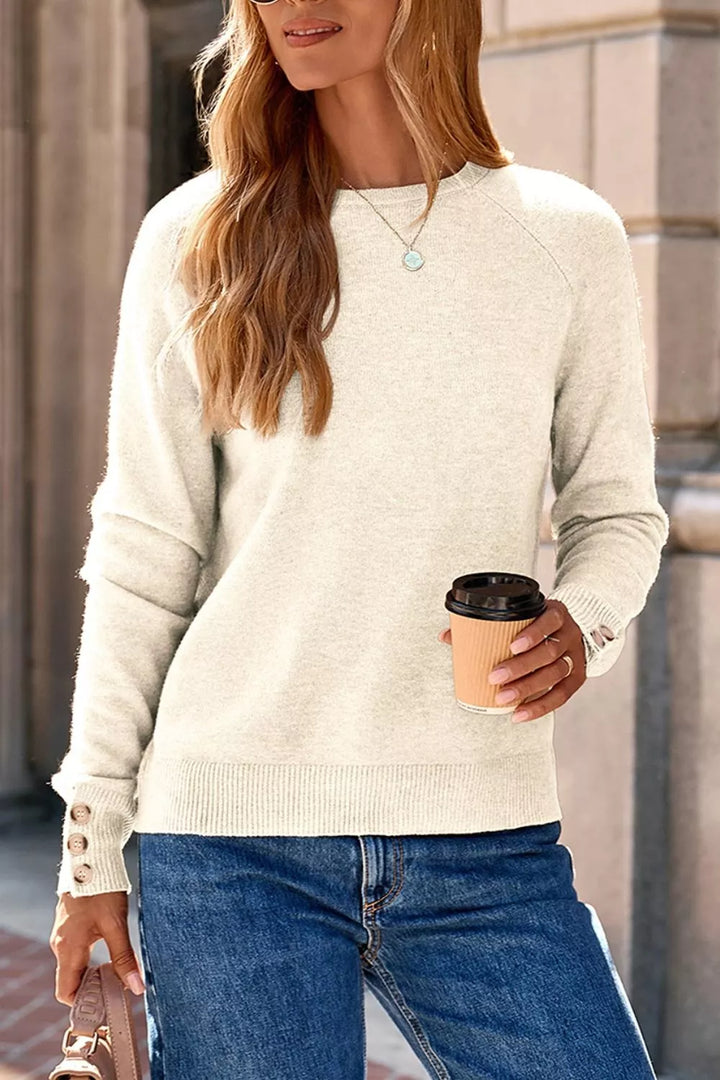 Button-cuff raglan sleeve crew neck sweater