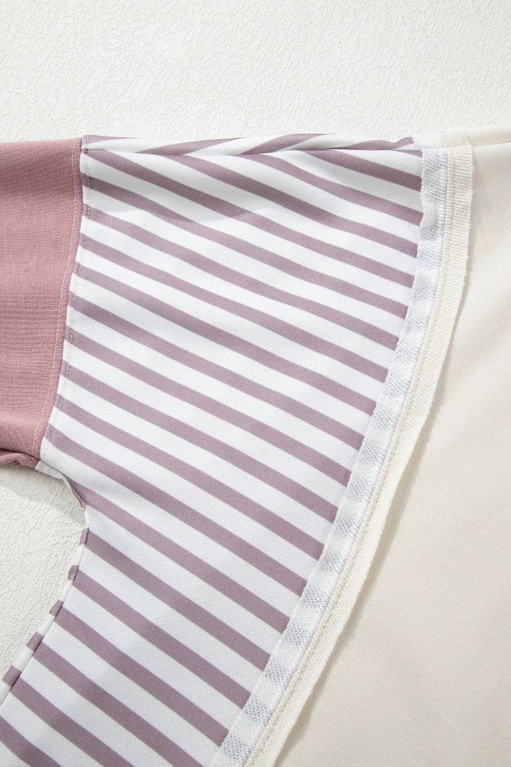 Color block striped dolman sweatshirt with side slit