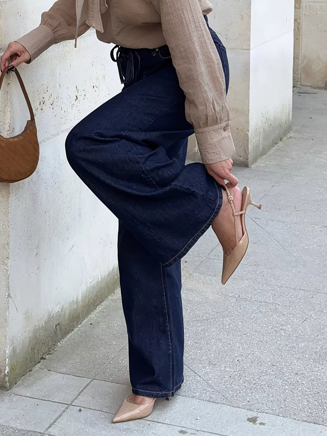 Tied-waist loose flare jeans in rigid cotton denim