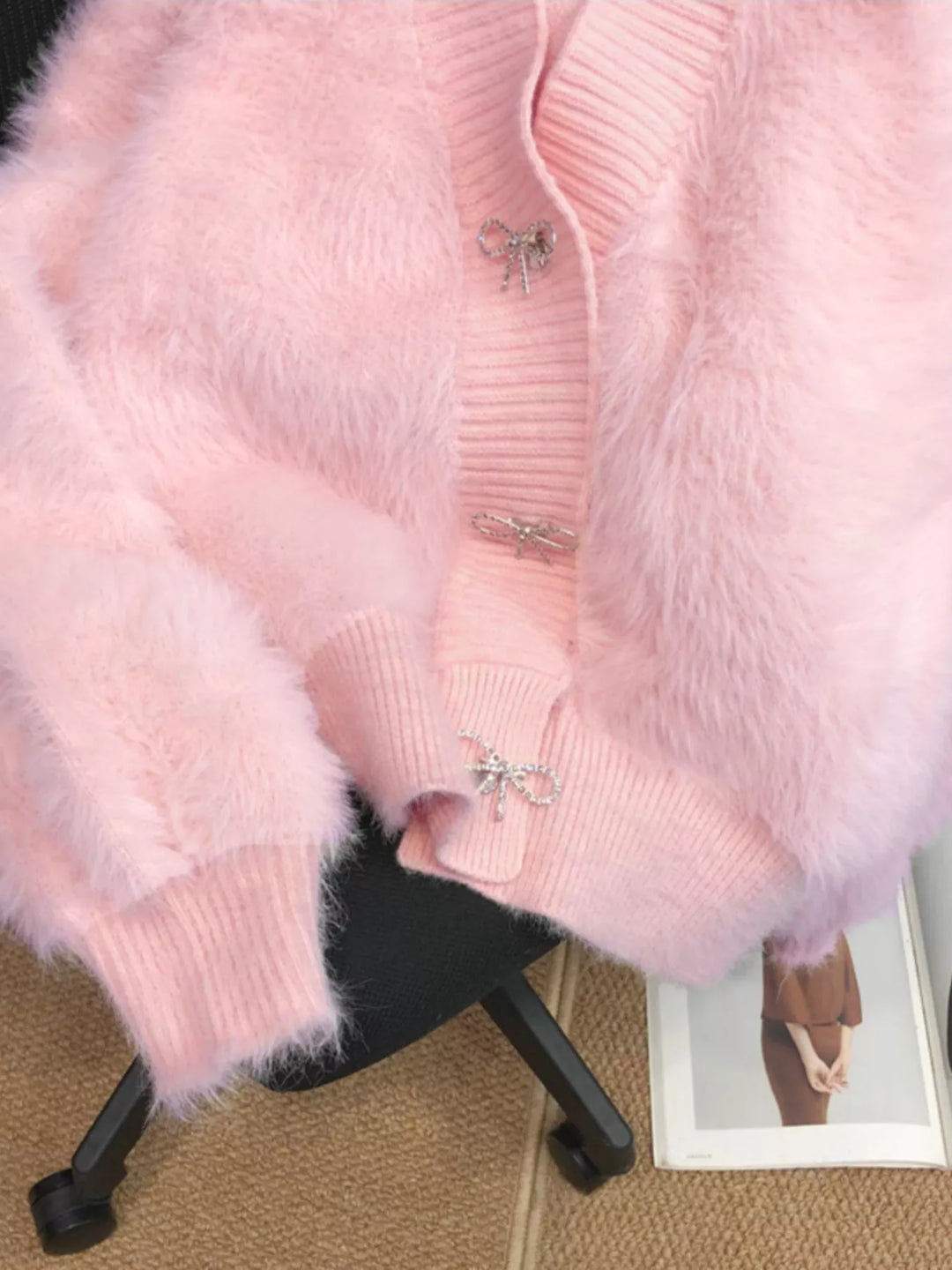 Fuzzy knit cropped cardigan with rhinestone bow buttons