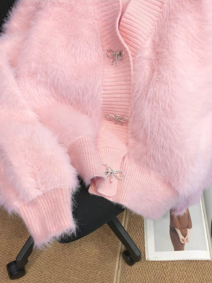Fuzzy knit cropped cardigan with rhinestone bow buttons