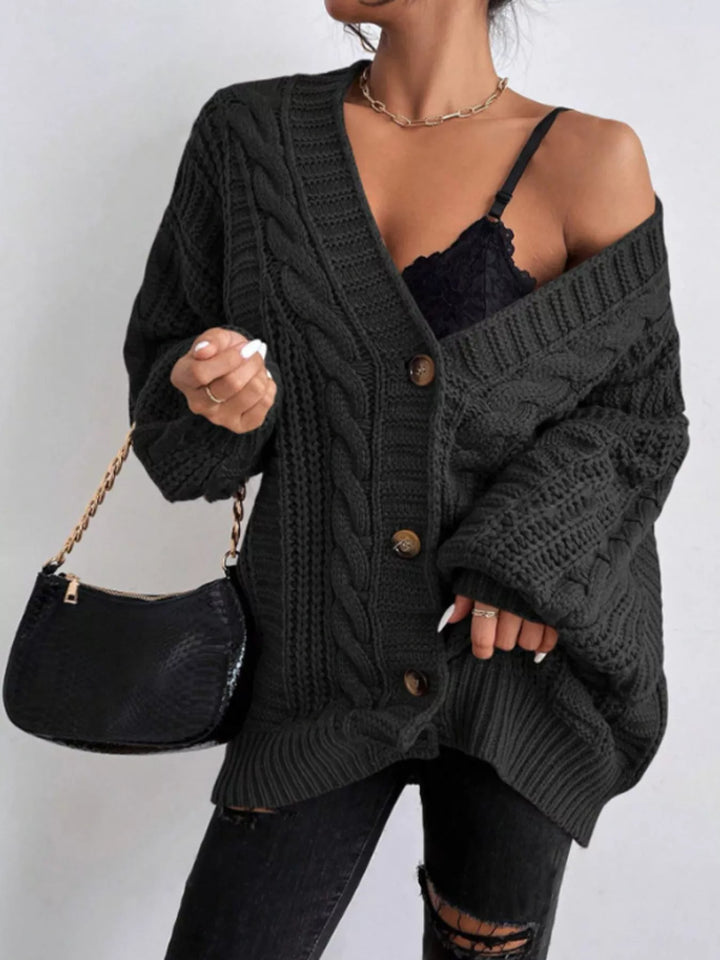 Oversized cable knit button-down cardigan with V-neck