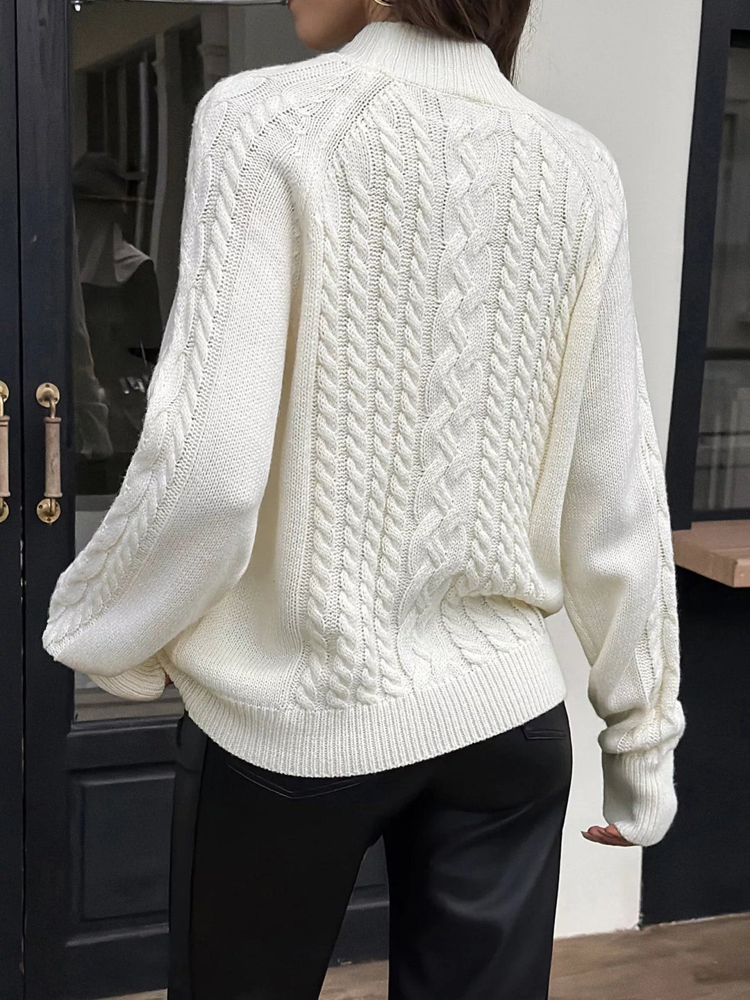 Cable-knit mock neck sweater with shoulder buttons