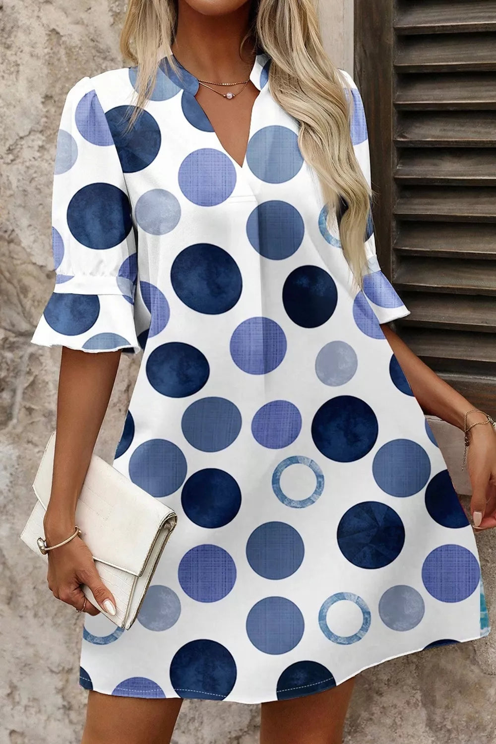 Polka dot v-neck mini dress with flounce sleeves