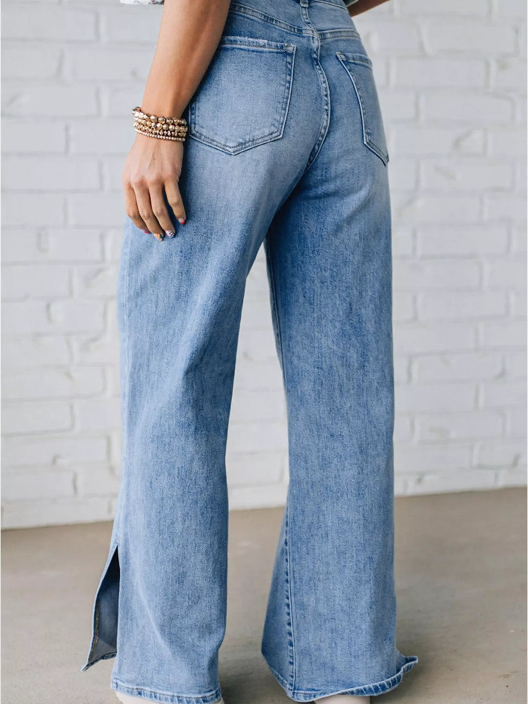 Drawstring wide-leg jeans with side slit hem