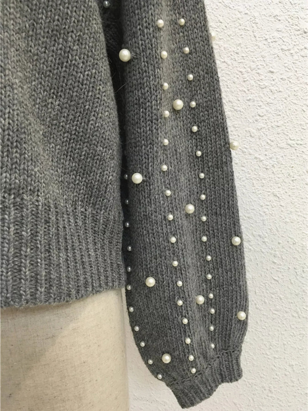 Pearl-embellished mock neck sweater with balloon sleeves