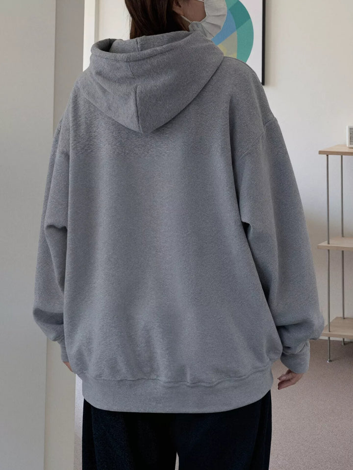 Oversized graphic pullover hoodie with kangaroo pocket