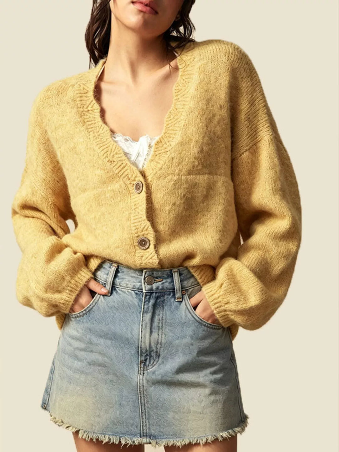 Oversized V-neck button-down knit cardigan with textured trim