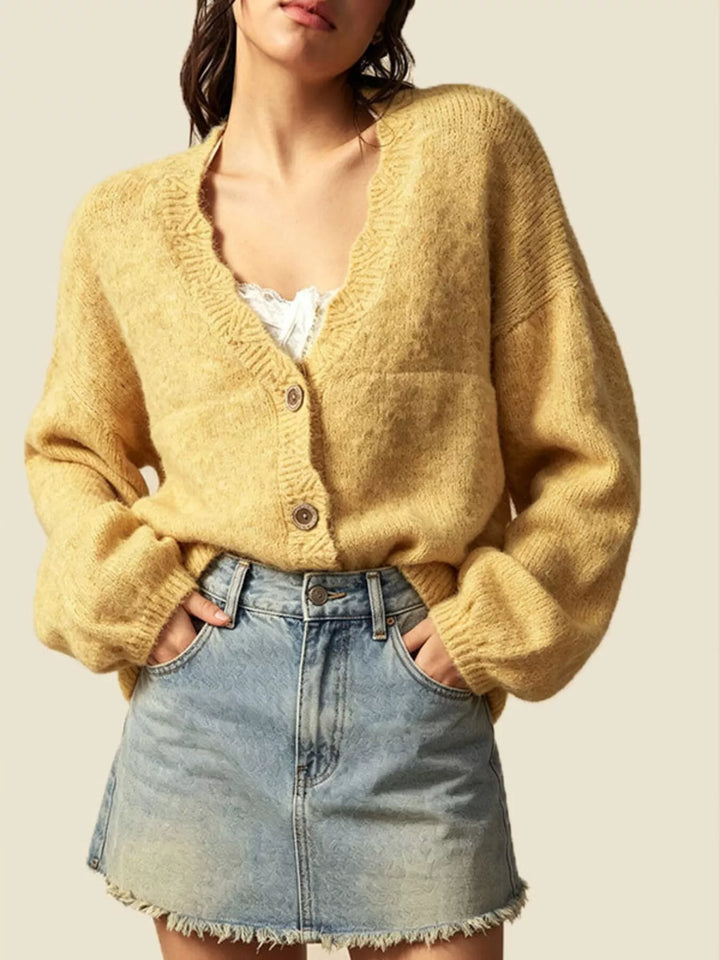 Oversized V-neck button-down knit cardigan with textured trim