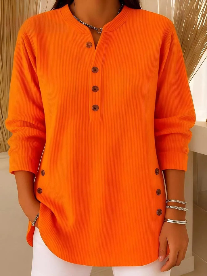 Orange Ribbed half-button henley top with side buttons