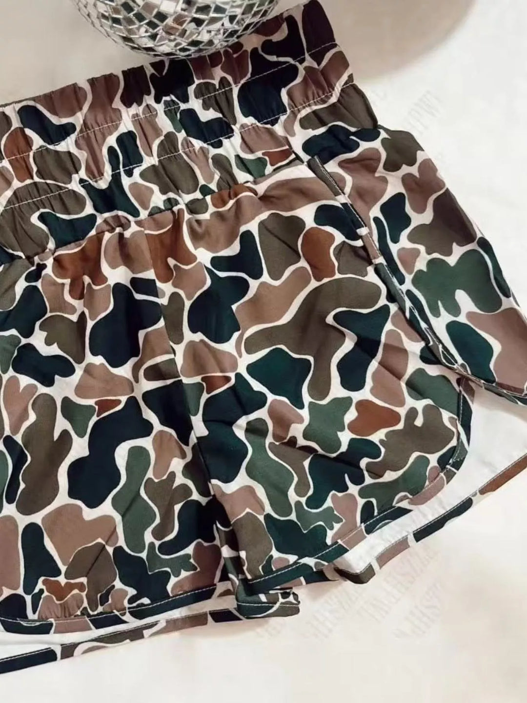 Camo print flowy running shorts with elastic waist
