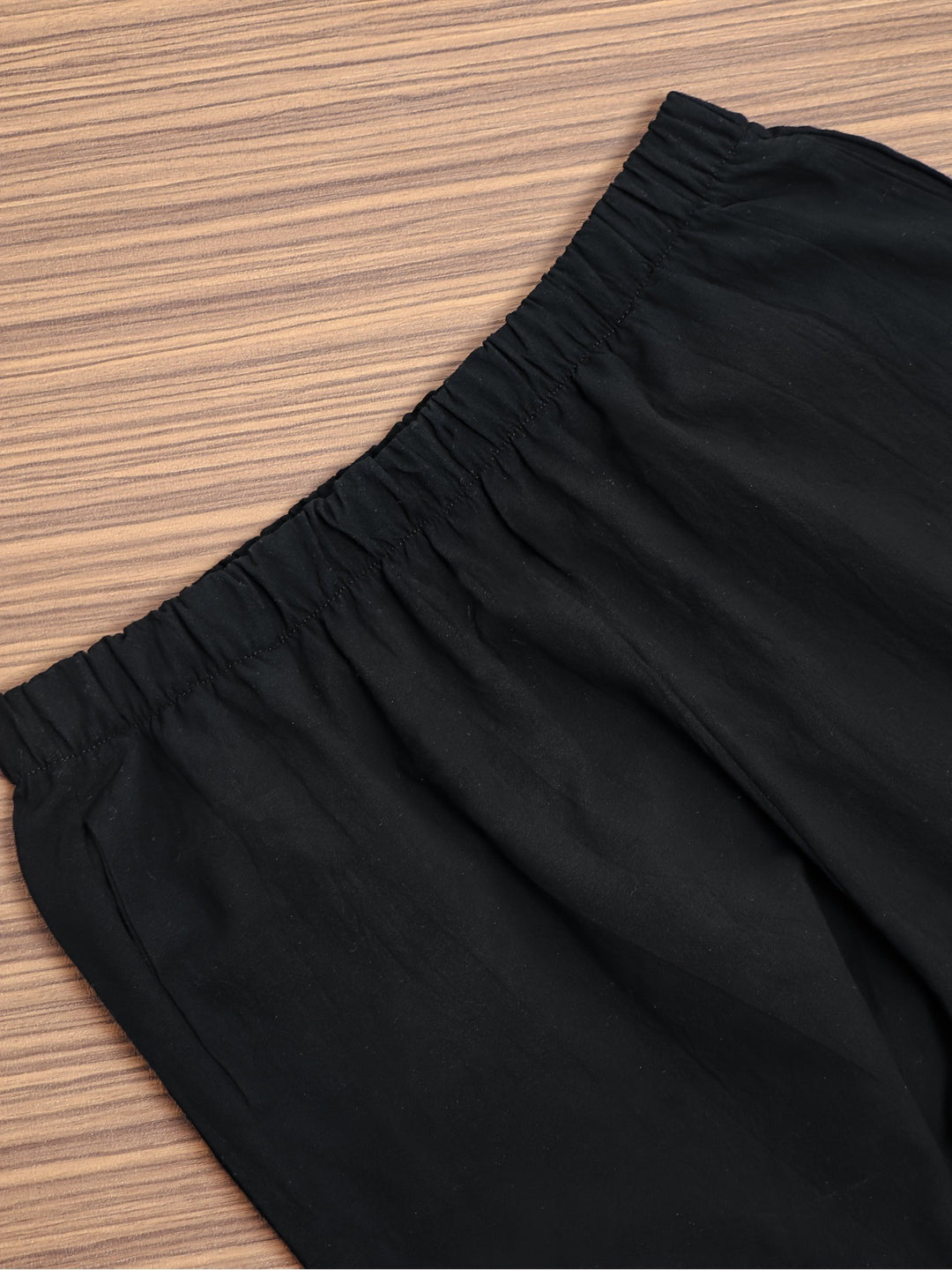 Elastic-waist wide-leg pants with tulip hem and pockets