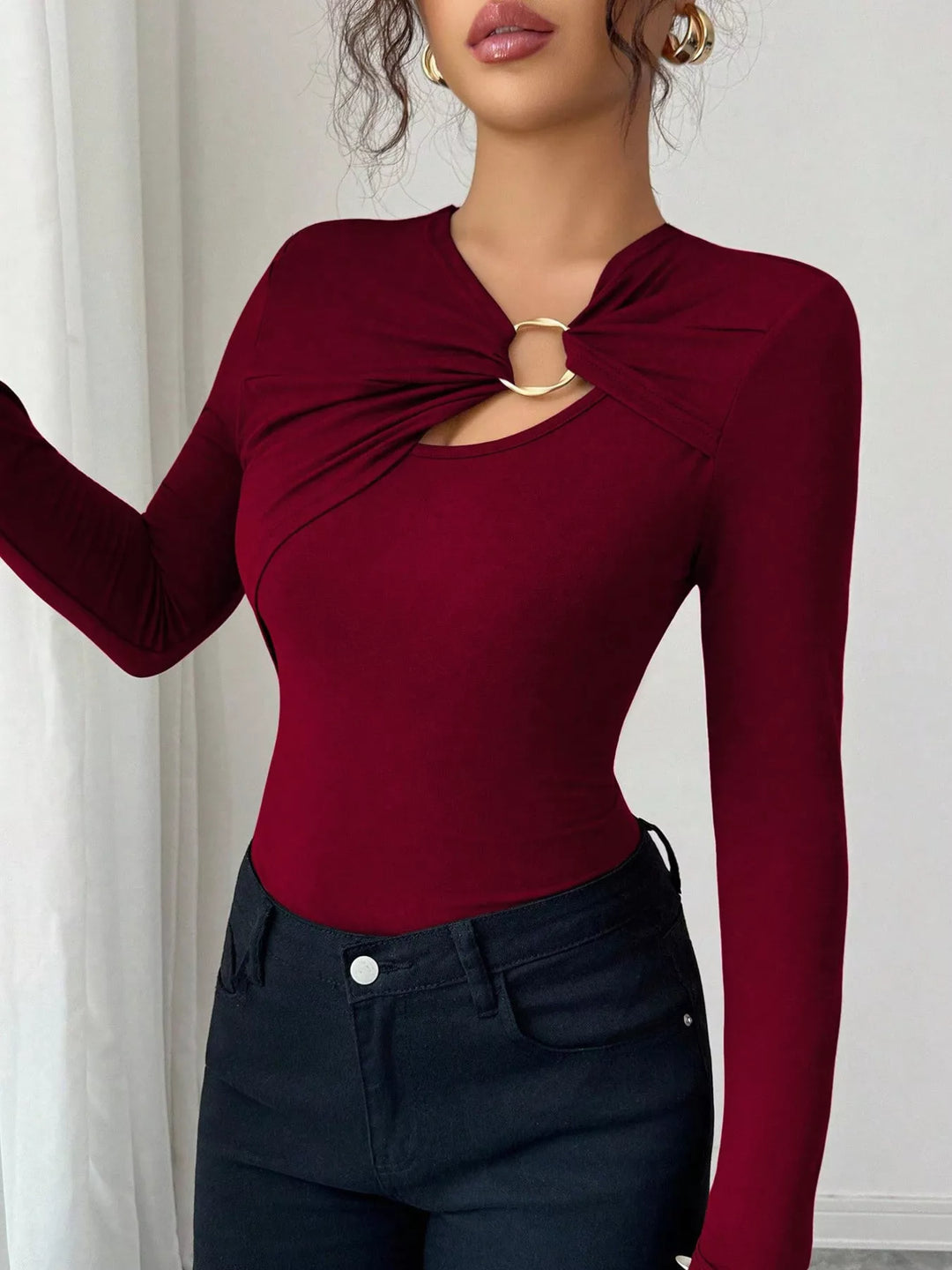 Twist front ring detail long sleeve top with cutout