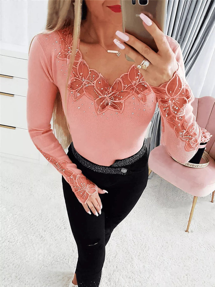 Ribbed knit top with floral lace trim and rhinestones