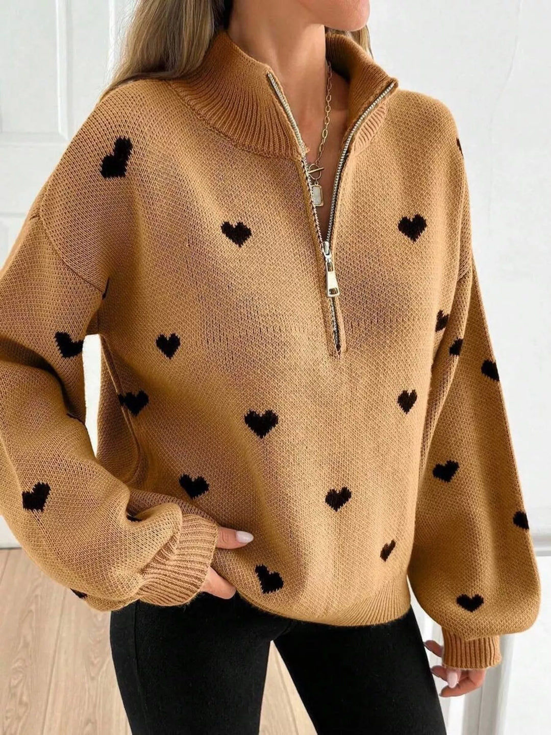 Heart print half-zip mock neck sweater with drop shoulders