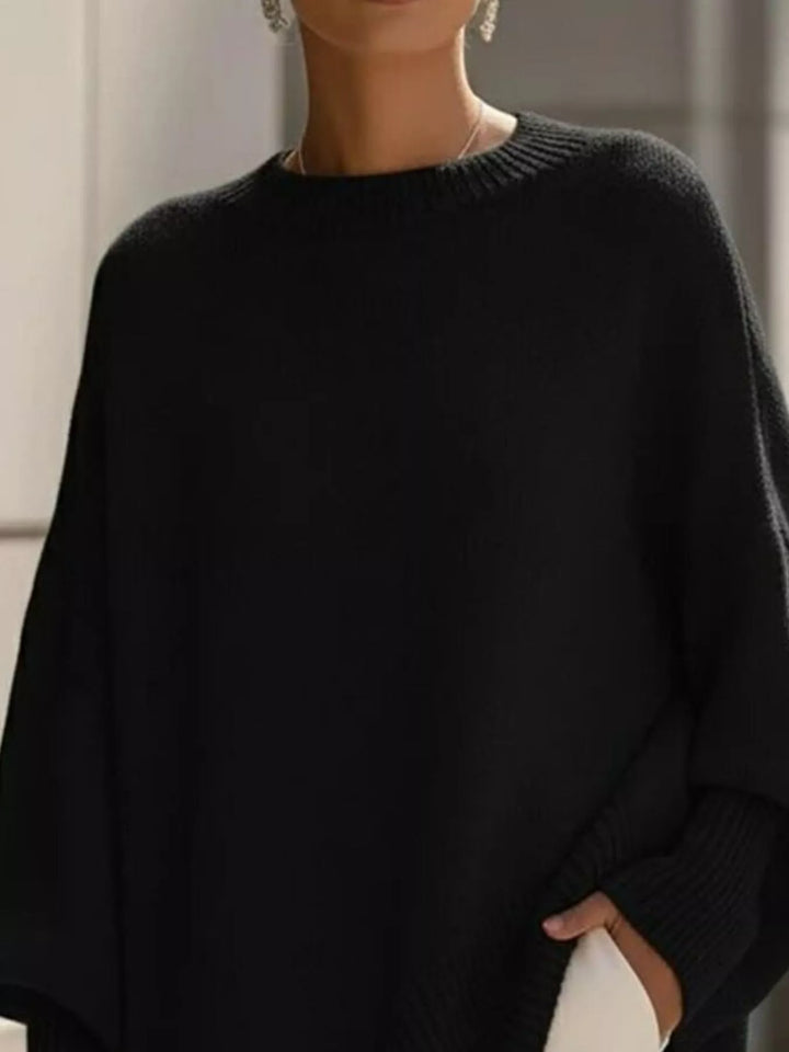 Batwing sleeve oversized sweater with asymmetric hem