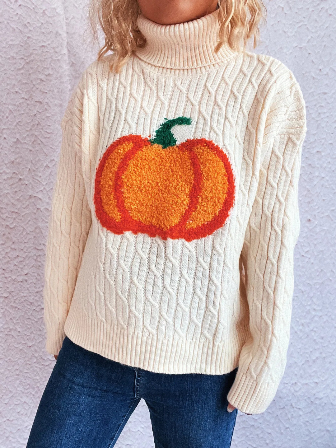 Pumpkin applique cable knit turtleneck sweater