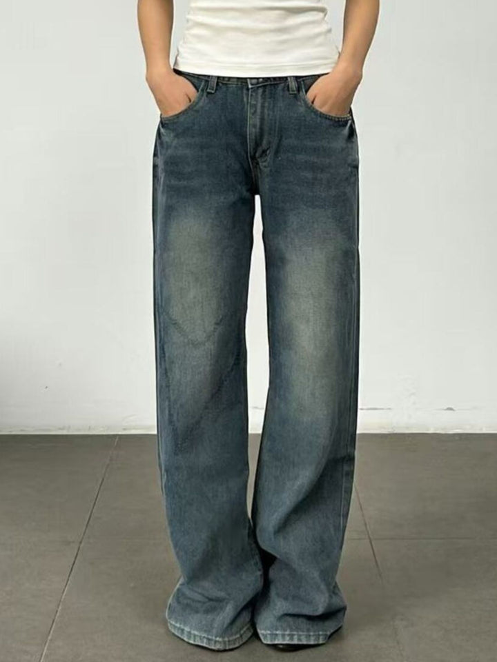 Vintage wash wide leg jeans with whiskered fading