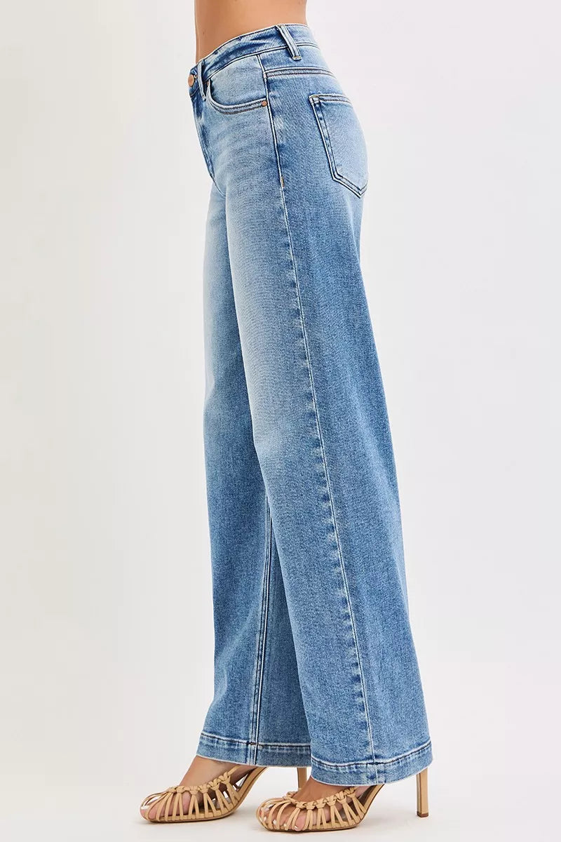 High-rise wide-leg baggy jeans with faded whiskers