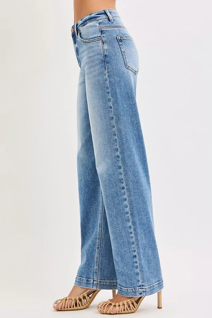 High-rise wide-leg baggy jeans with faded whiskers