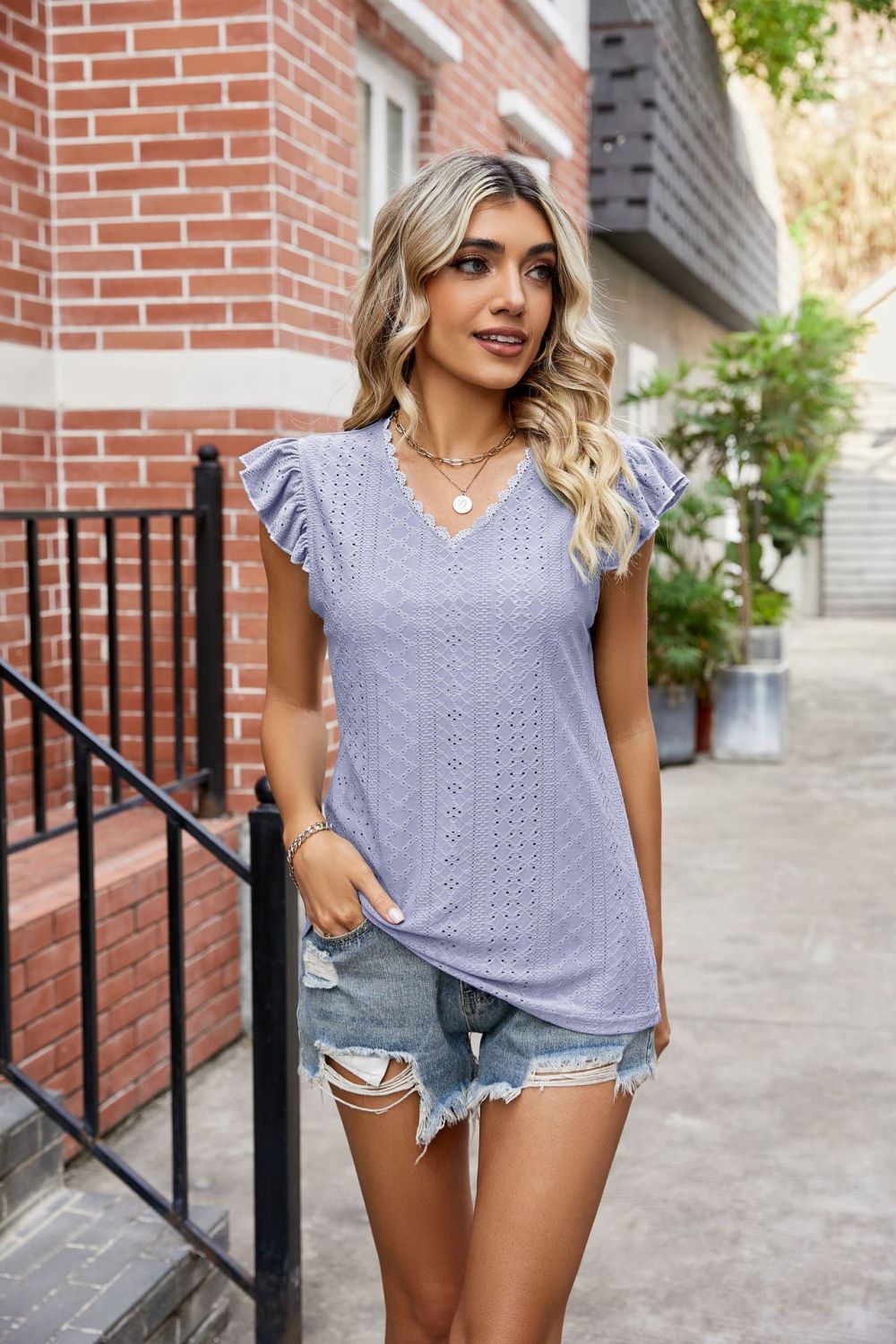 Eyelet flutter sleeve top with scalloped V-neck