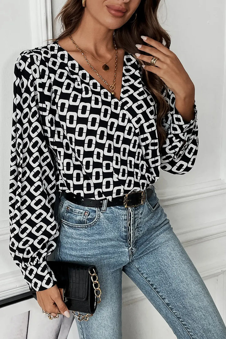 Geometric print wrap-front V-neck long sleeve blouse