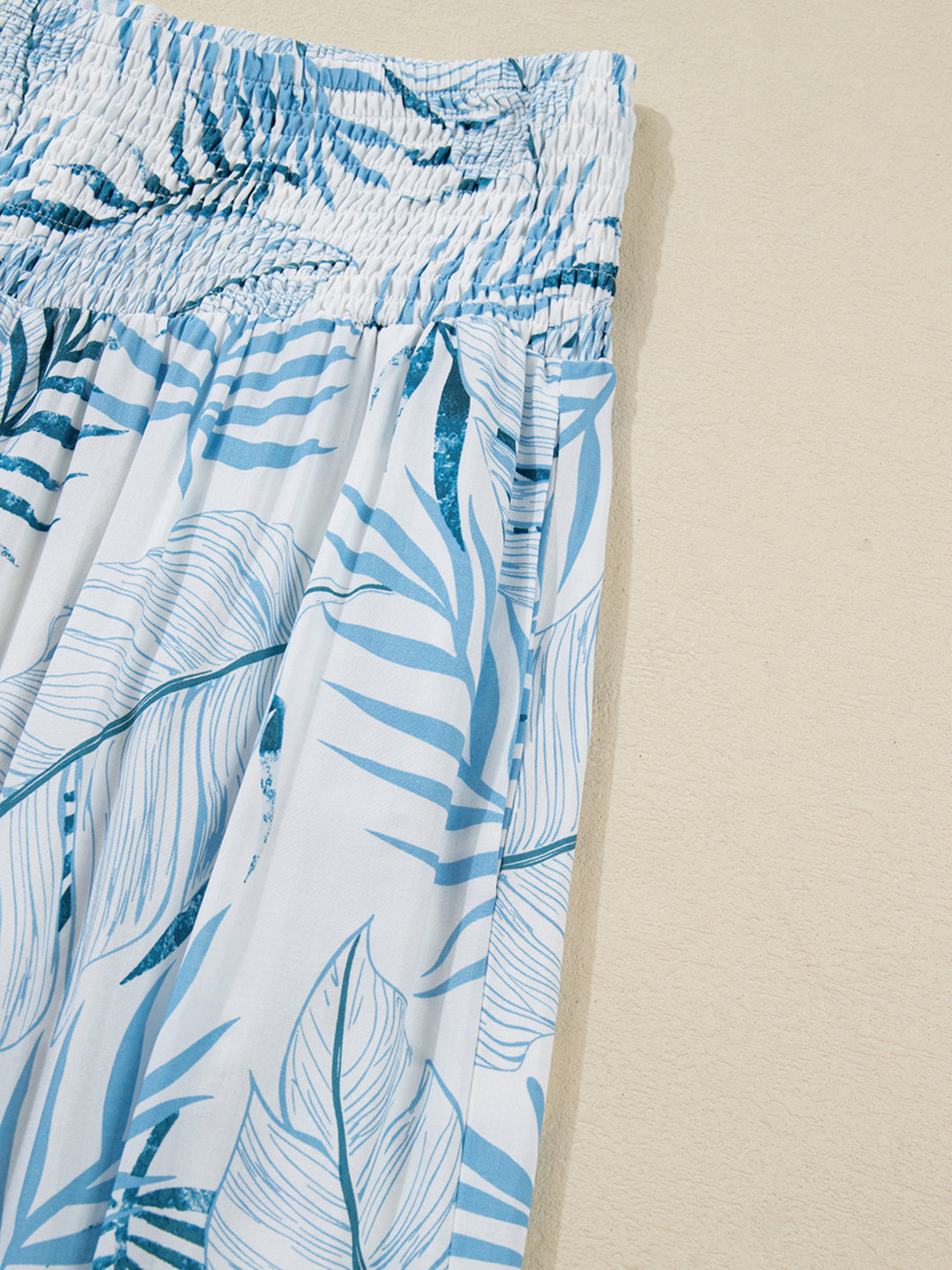 Tropical leaf print shirred-waist wide-leg pants