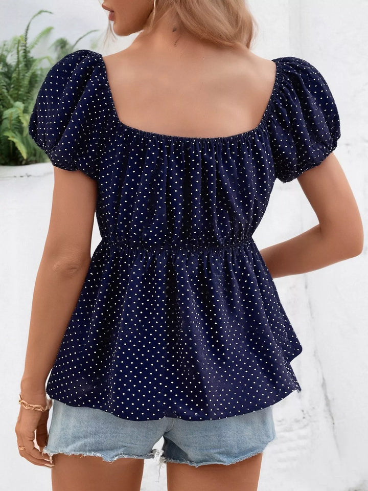 Polka dot scoop-neck peplum blouse with puff sleeves