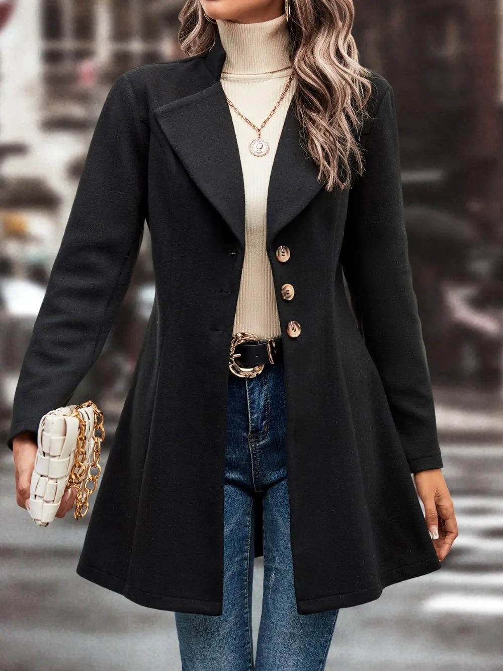 Button-front longline coat with notched lapel and flared hem