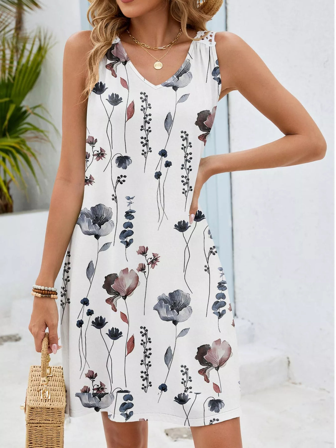 Watercolor floral mini dress with crochet cutout back
