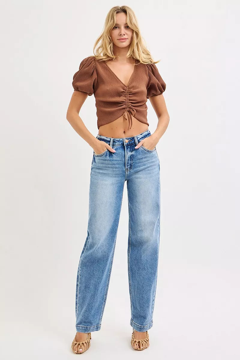 High-rise wide-leg baggy jeans with faded whiskers