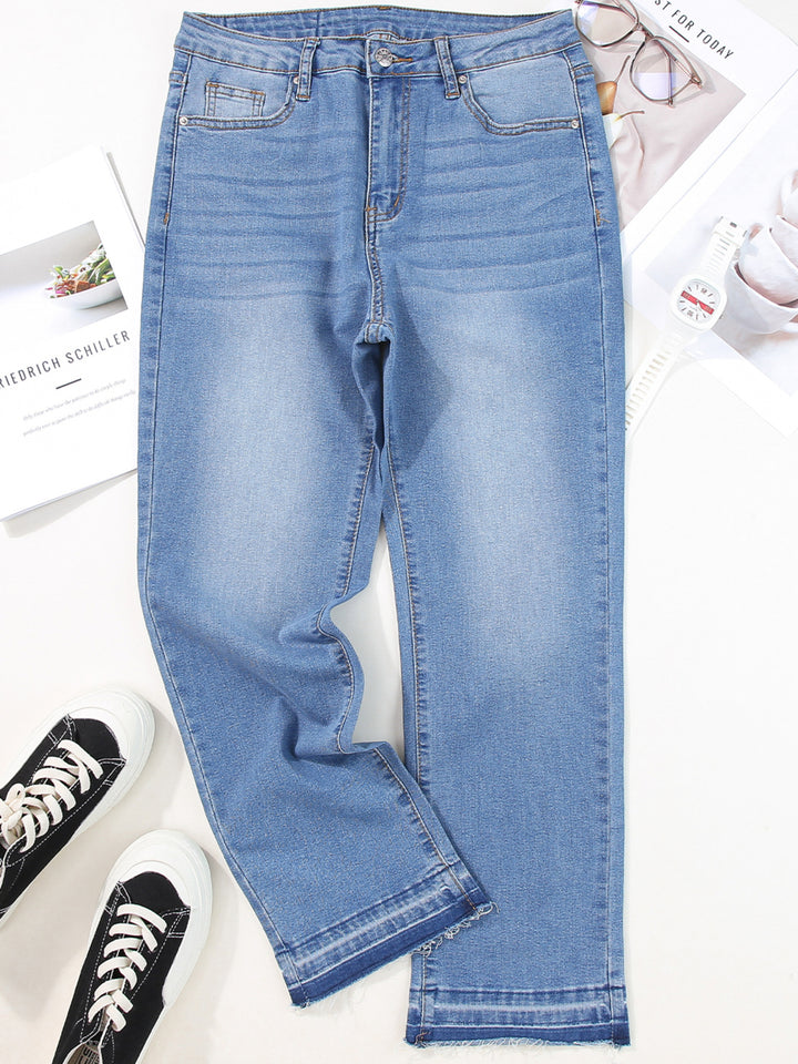 High-rise whiskered wash raw hem cropped jeans