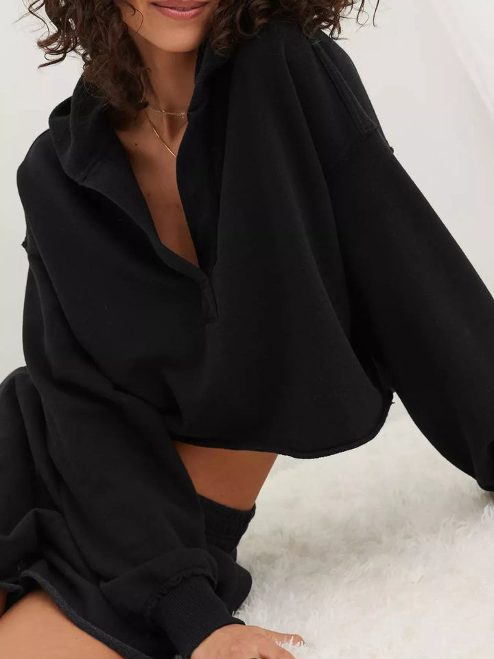 Cropped exposed-seam pullover hoodie with split neck